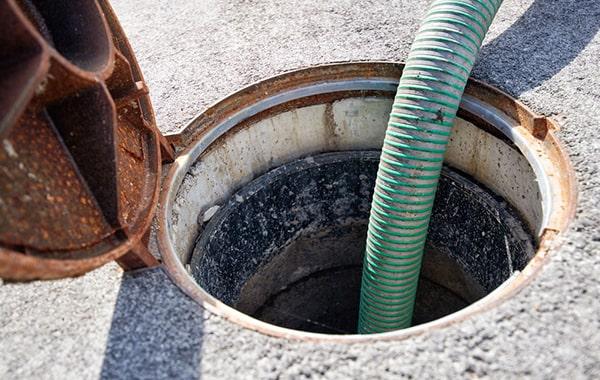 foul odors, slow draining pipes sinks, and grease build-up in the trap are all signs that grease trap pumping services are needed